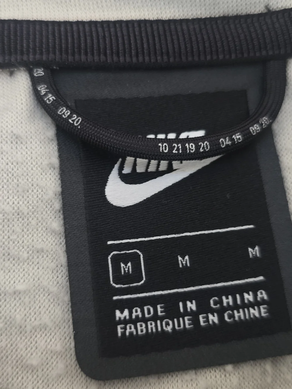 Nike Tech Pack hoodie, size M.